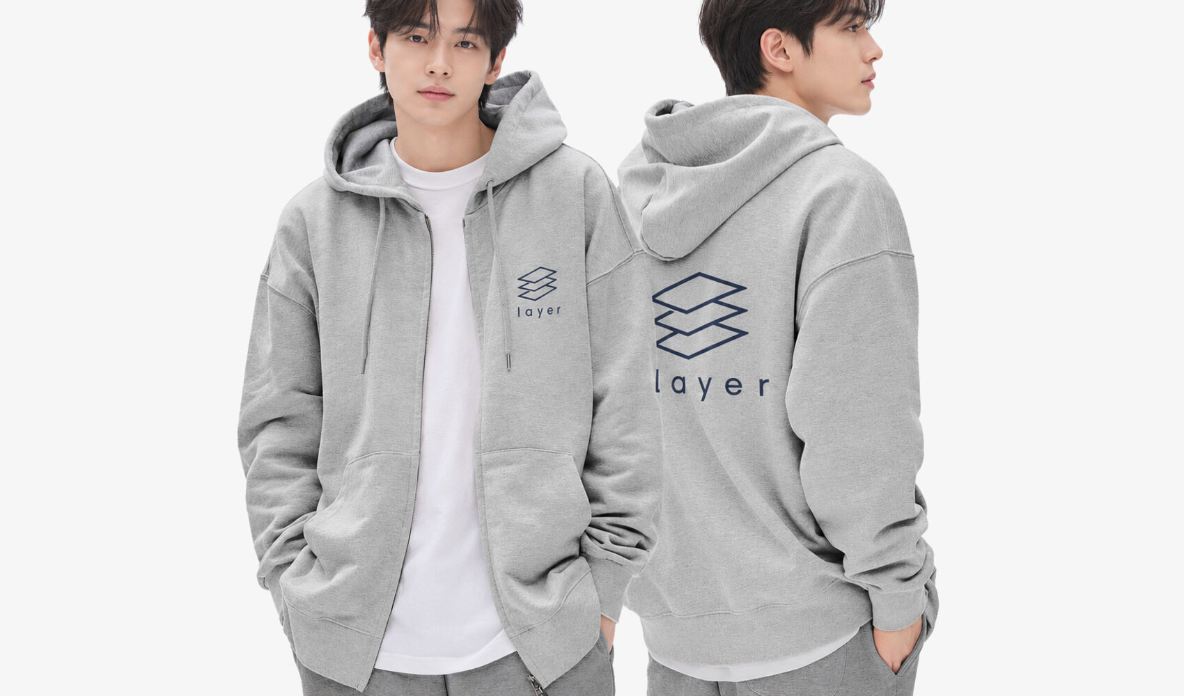 마플 비캔버스 스페셜 인터록 오버핏 후드집업에 layer 예시 로고를 앞면과 뒷면에 넣은 남성 스튜디오 착용 이미지